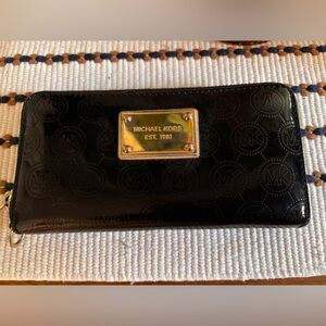 Michael Kors Black Patent Leather Embossed Zip Wallet with Gold Plaque
